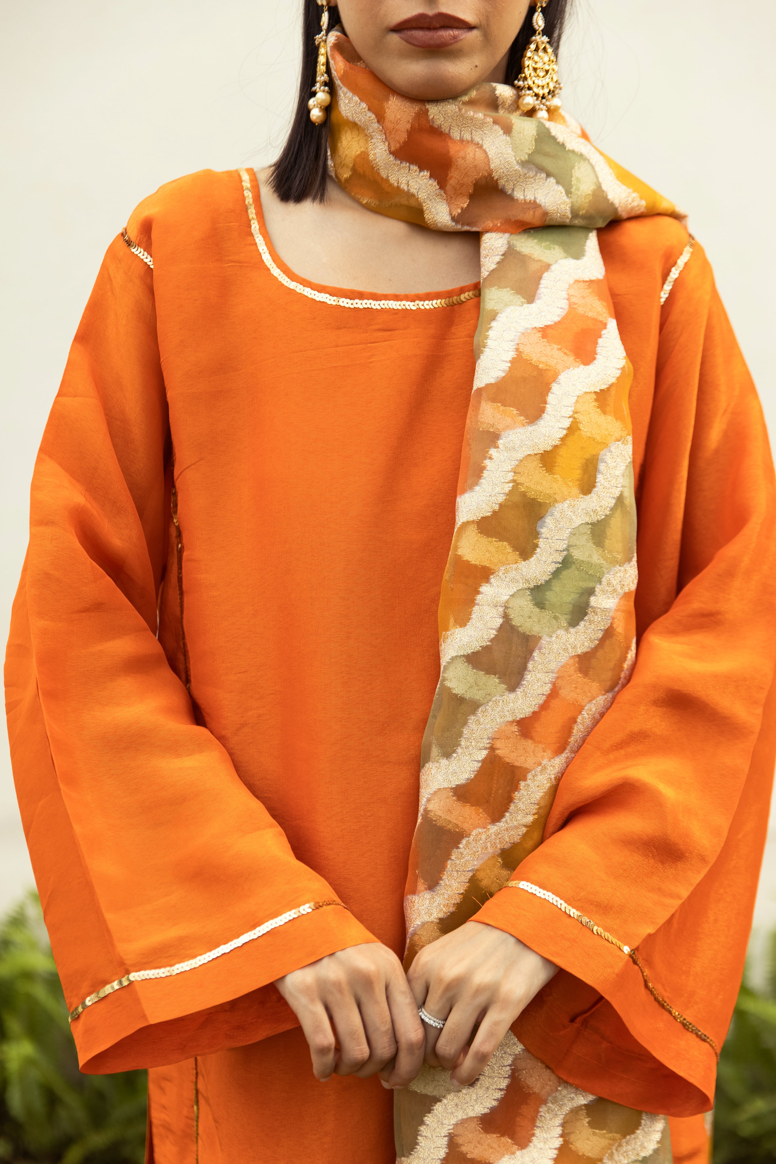 Noor Farshi Salwar Orange set